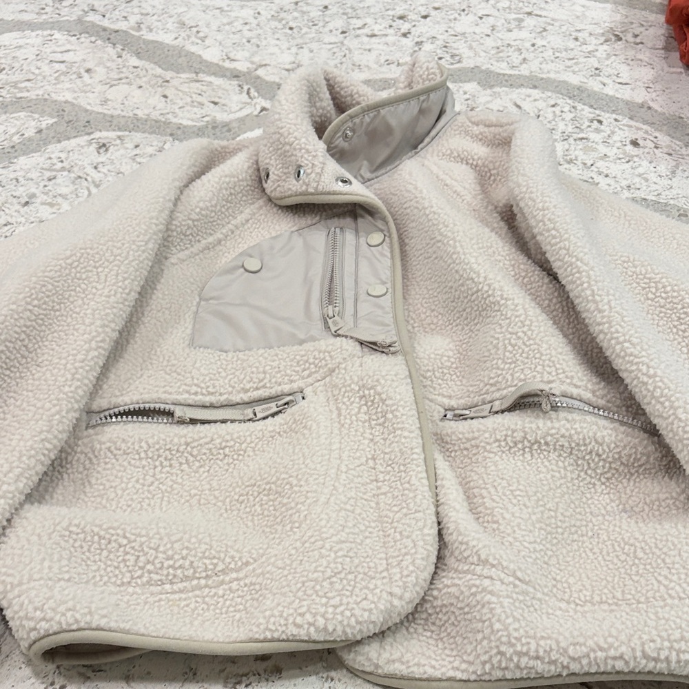 Free People movement hit the slopes button up
Cream color
Gently used